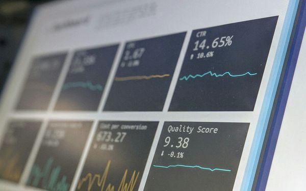Analytics metrics on a bright monitor (stock photo, Unsplash)